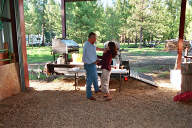 Joe and Nora cooking steaks