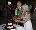 Gary and Dona cutting cake