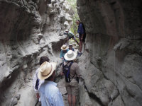 Gary setting up camera on ledge in slot canyon