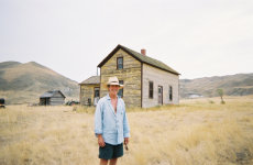 Ian in front of the homestead