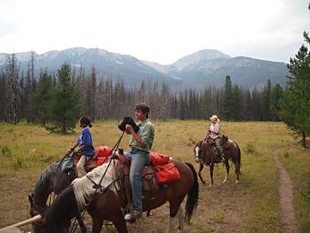 Andrea, Adin and Zia on the trail