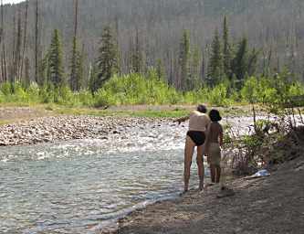 Gary coaching Zia about crossing the creek