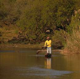 Popa Falls Man In Boat