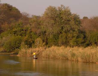 Popa Falls Man In Boat