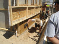 Alfred inspecting first part of wall