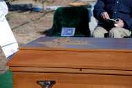 Dust trailed on casket