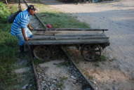 Man moving train cart off tracks