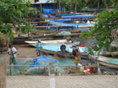 Fishermen mending their nets