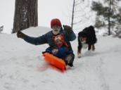 Gary and Dylan Sledding