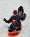 Gary and Dylan Sledding