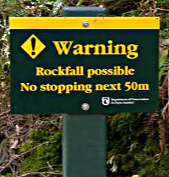 Alps Overhanging Rock Sign